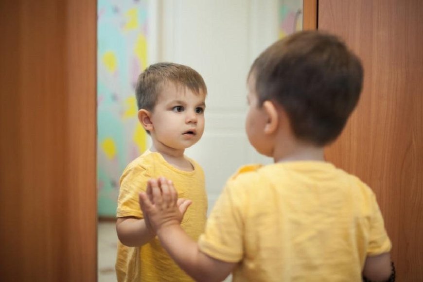 How does a child perceive himself looking in the mirror?